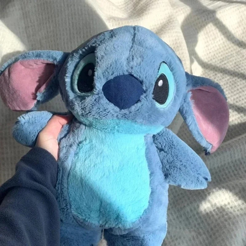 Stitch de Pelúcia com Bolsa Térmica - News™
